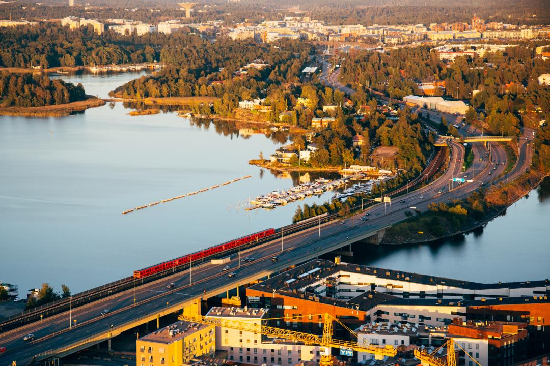 An aerial photo of Kulosaari bridge, kalasatama on the right, Kulosaari in the upper corner