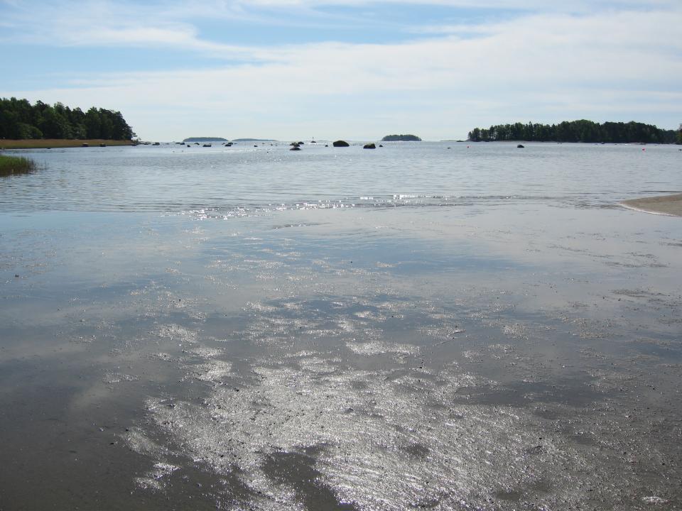 View of the sea and distant islands on a sunny day from Kallahdenniemi swimming beach