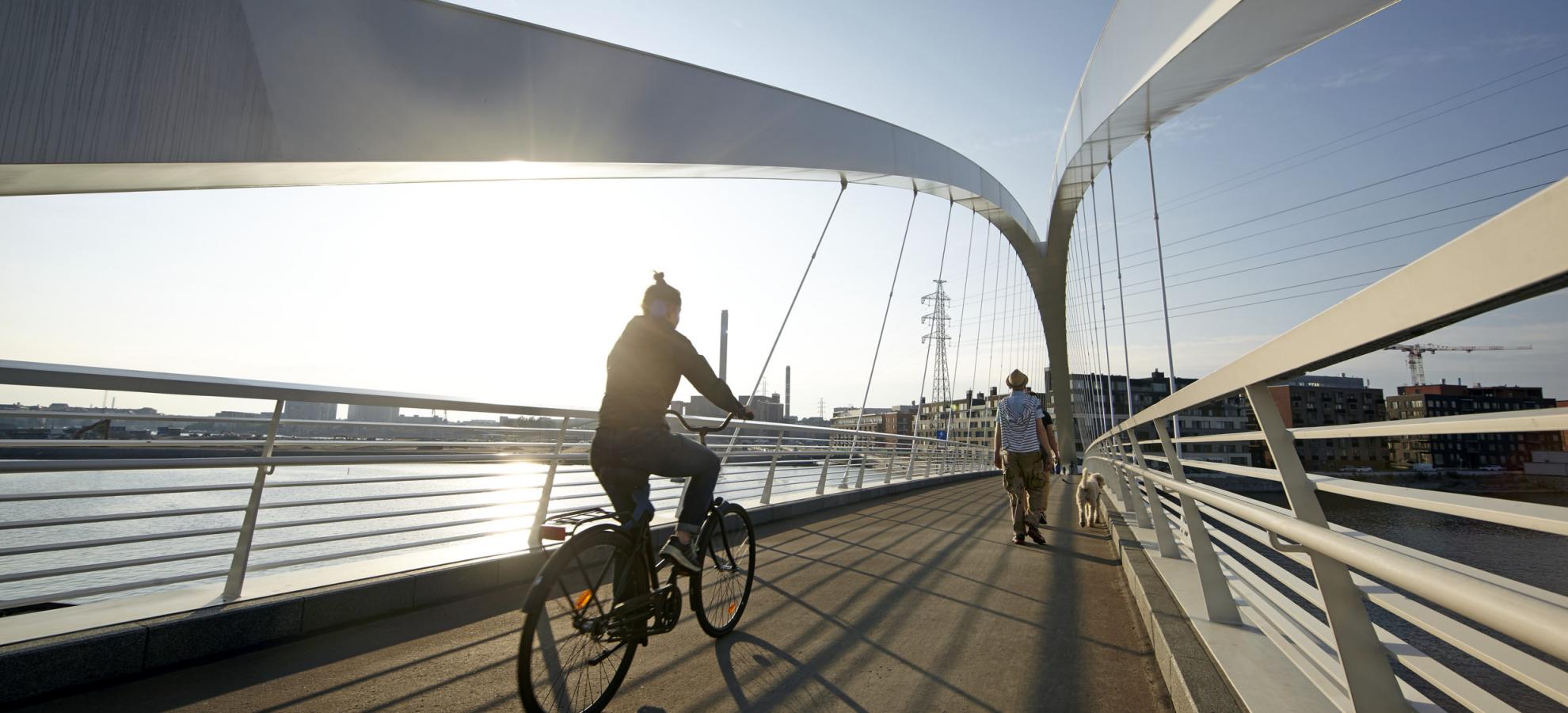 Cyclist on a bridge. 
