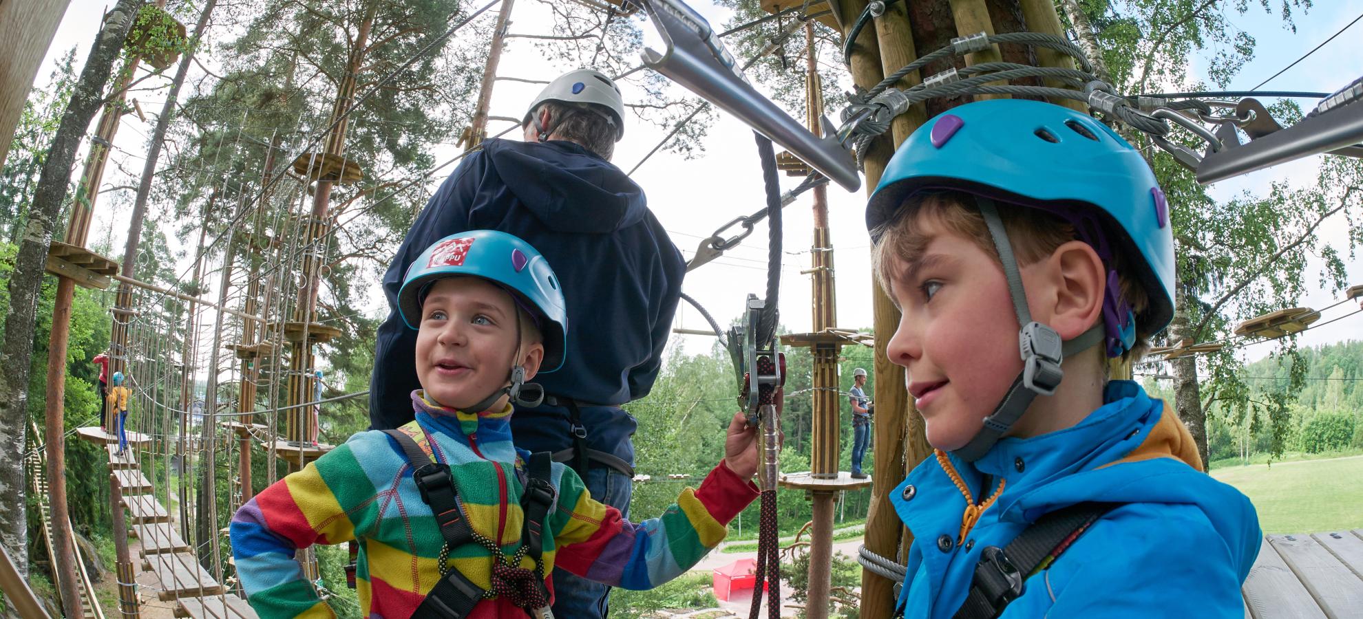 Two kids at Treetop Adventure Park HUIPPU